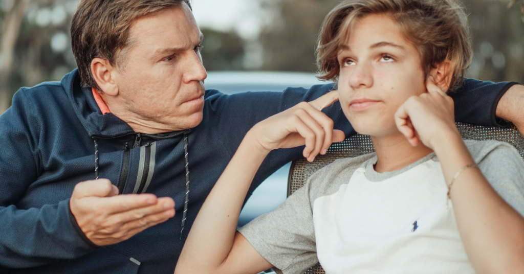 Dad scolding his son about doing better in sports. Encourage athletes better with positive coaching and Hey Coach