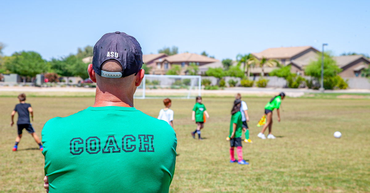 Athletes training with Coach - Hey Coach June Blog 1 Coach encourages team through positive coaching he learned through Hey Coach