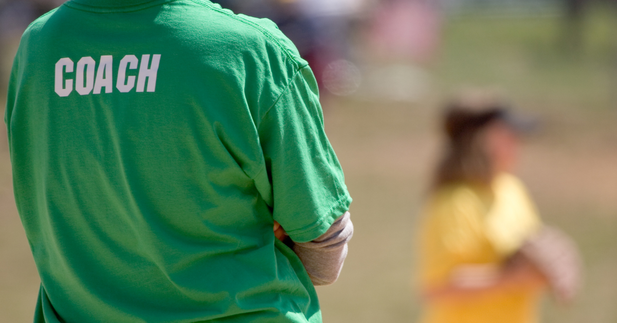 Off the Grid This Summer - Hey Coach Featured Image June Blog 1 Coach encouraging the team of young players